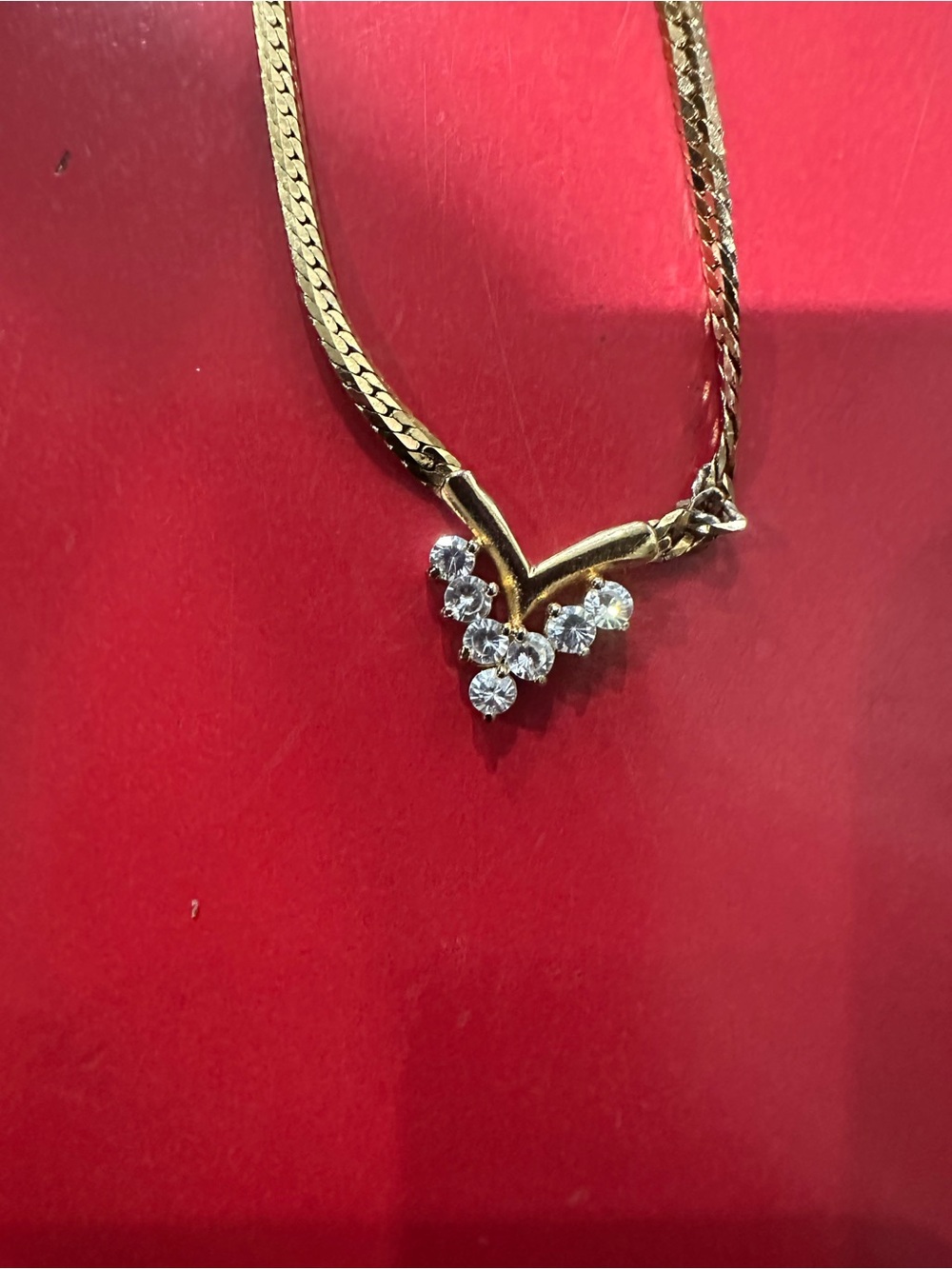 Gold-tone V Pendant Necklace with Clear Crystal Accents